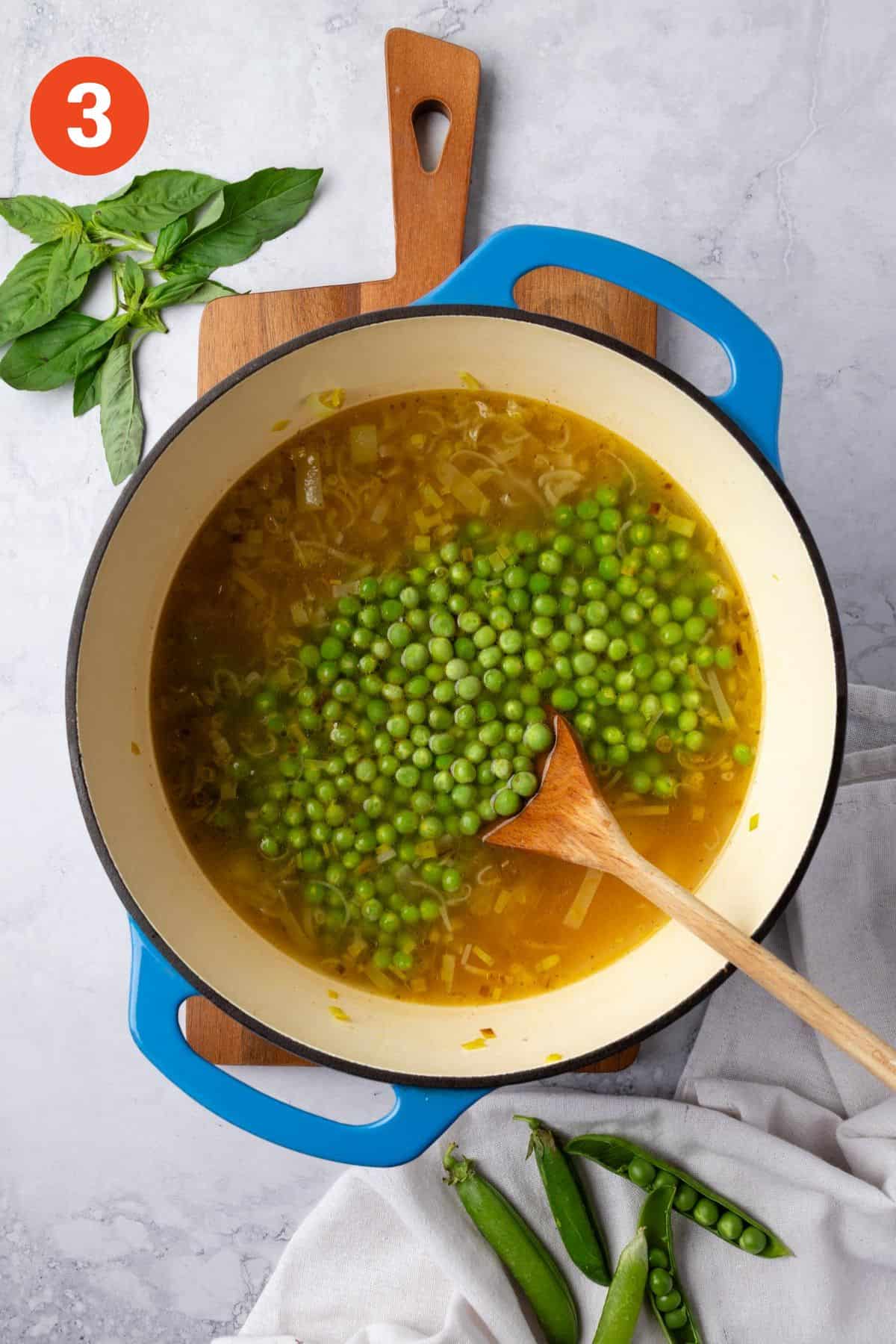 Green peas added to the soup.