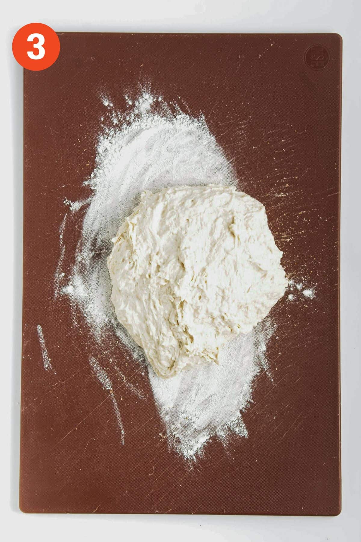 Roll dough turned out on a cutting board lightly dusted with flour.