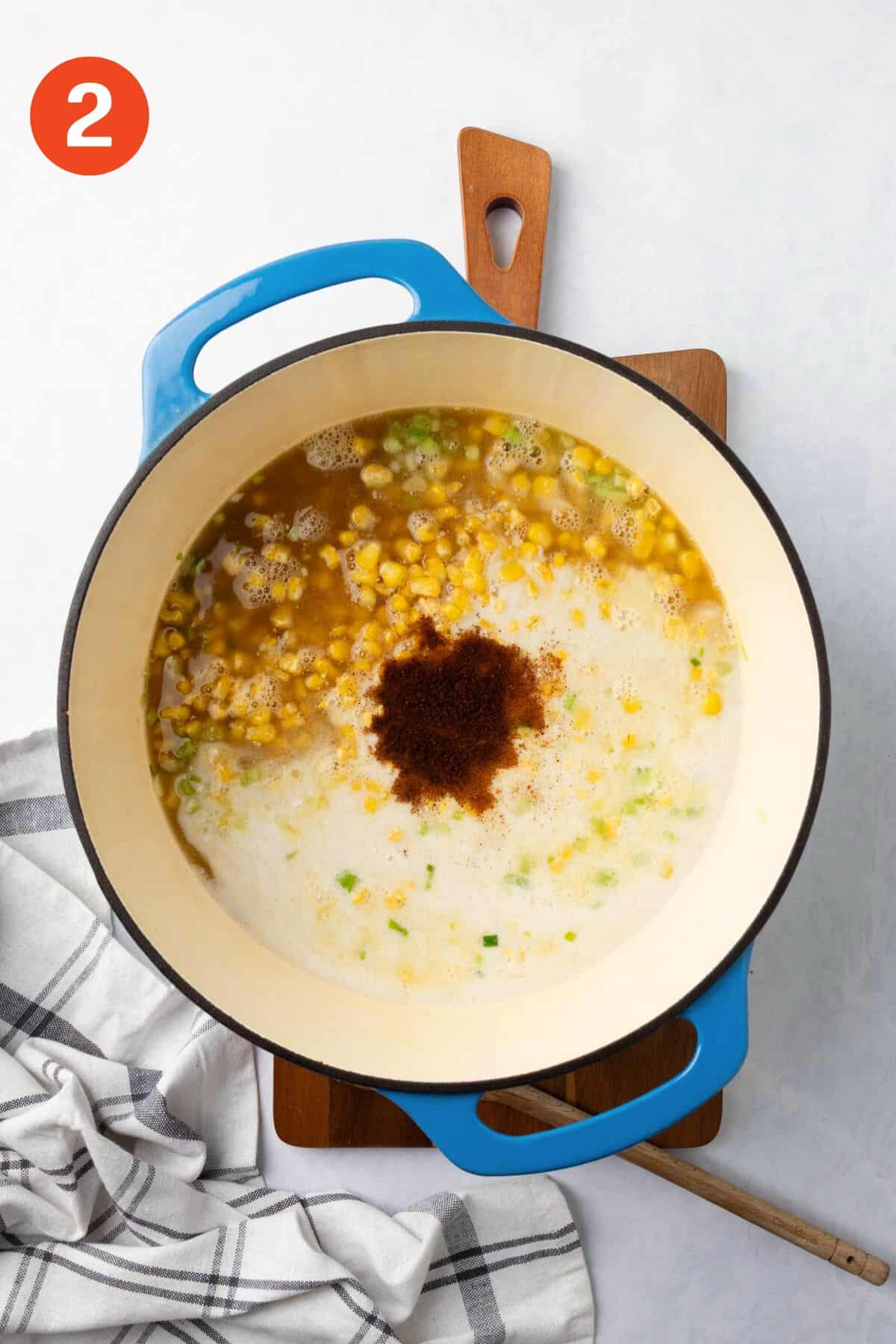 Everything added to the pot to make creamy corn soup.