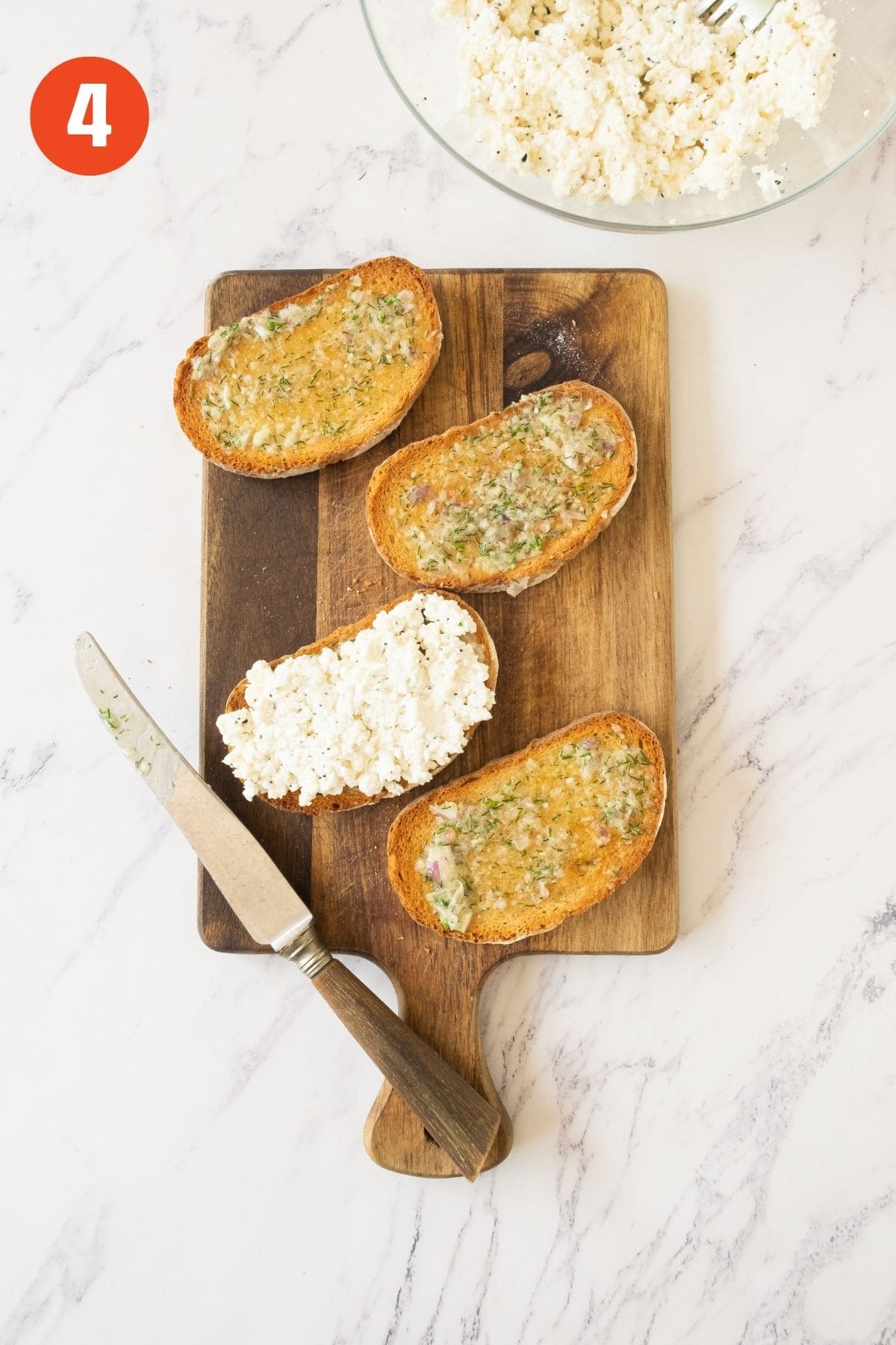 Garlic butter spread and then the ricotta added to toasts.