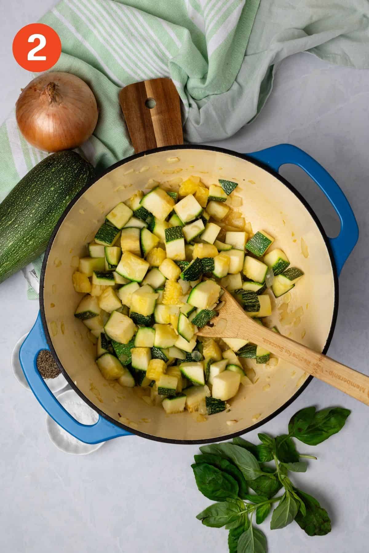 Zucchini added to the pot.