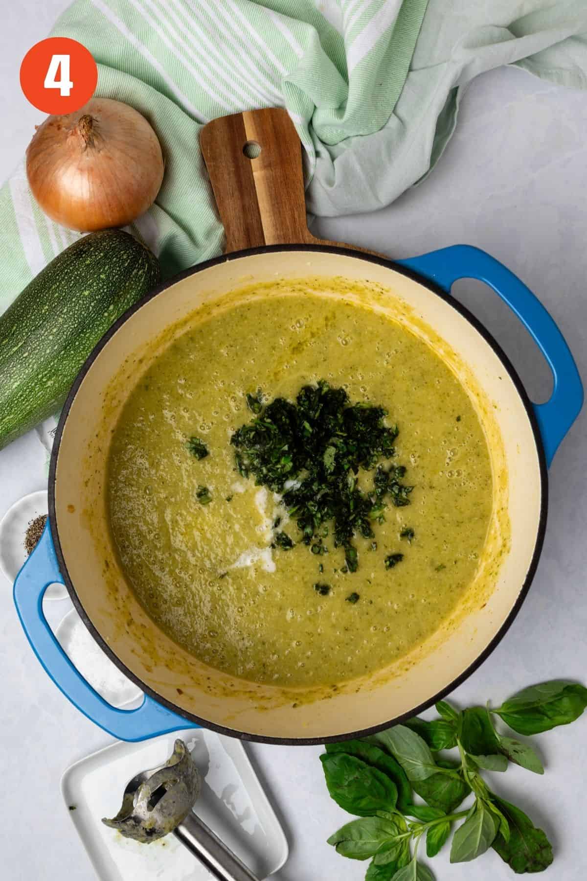 Herbs added to the blended soup.