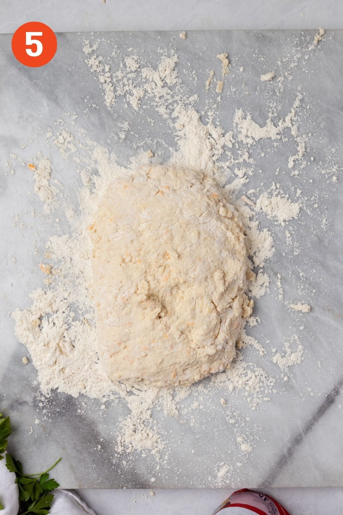 Biscuit dough shaped into a rectangle.