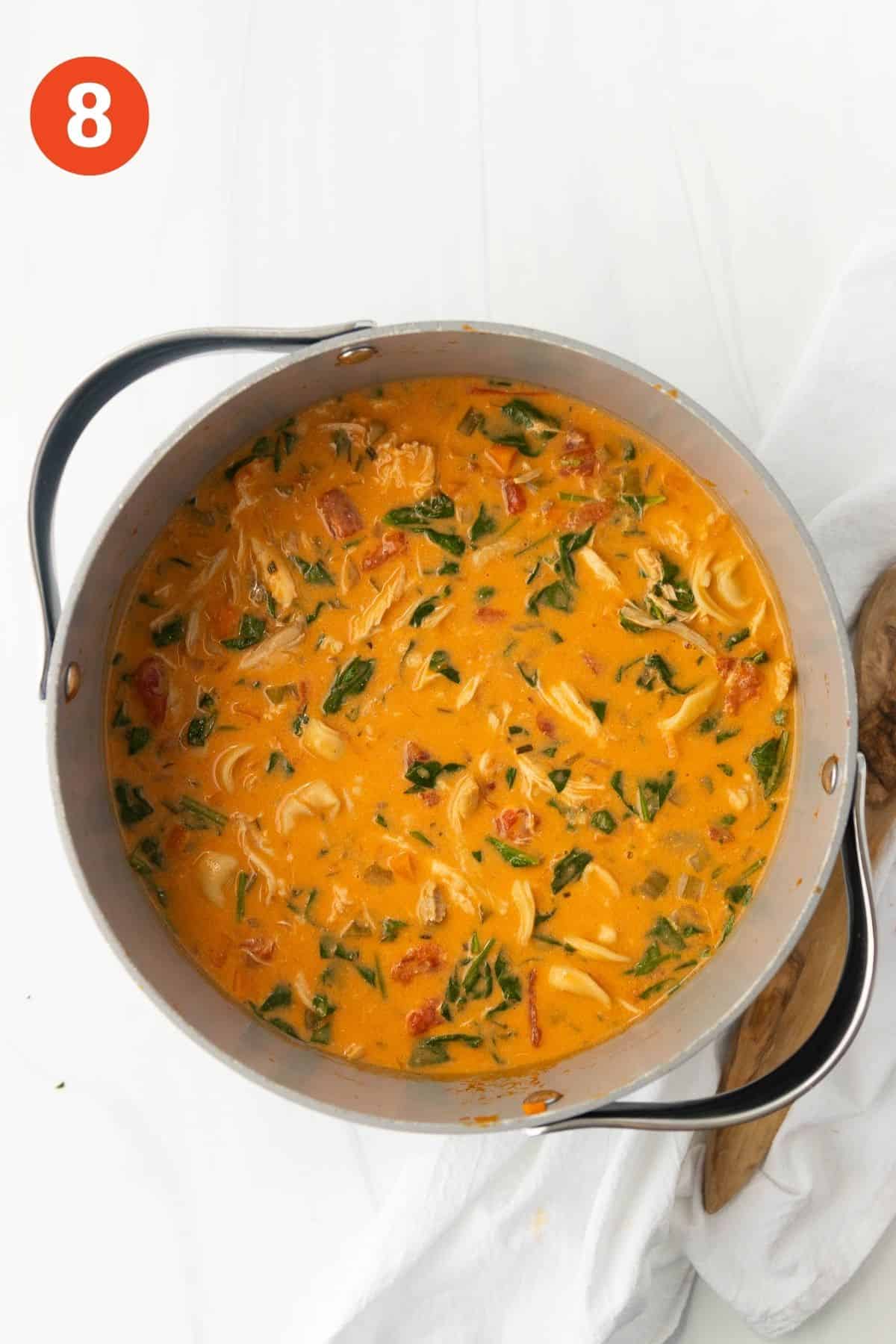 Creamy chicken tortellini soup finished and ready to serve.