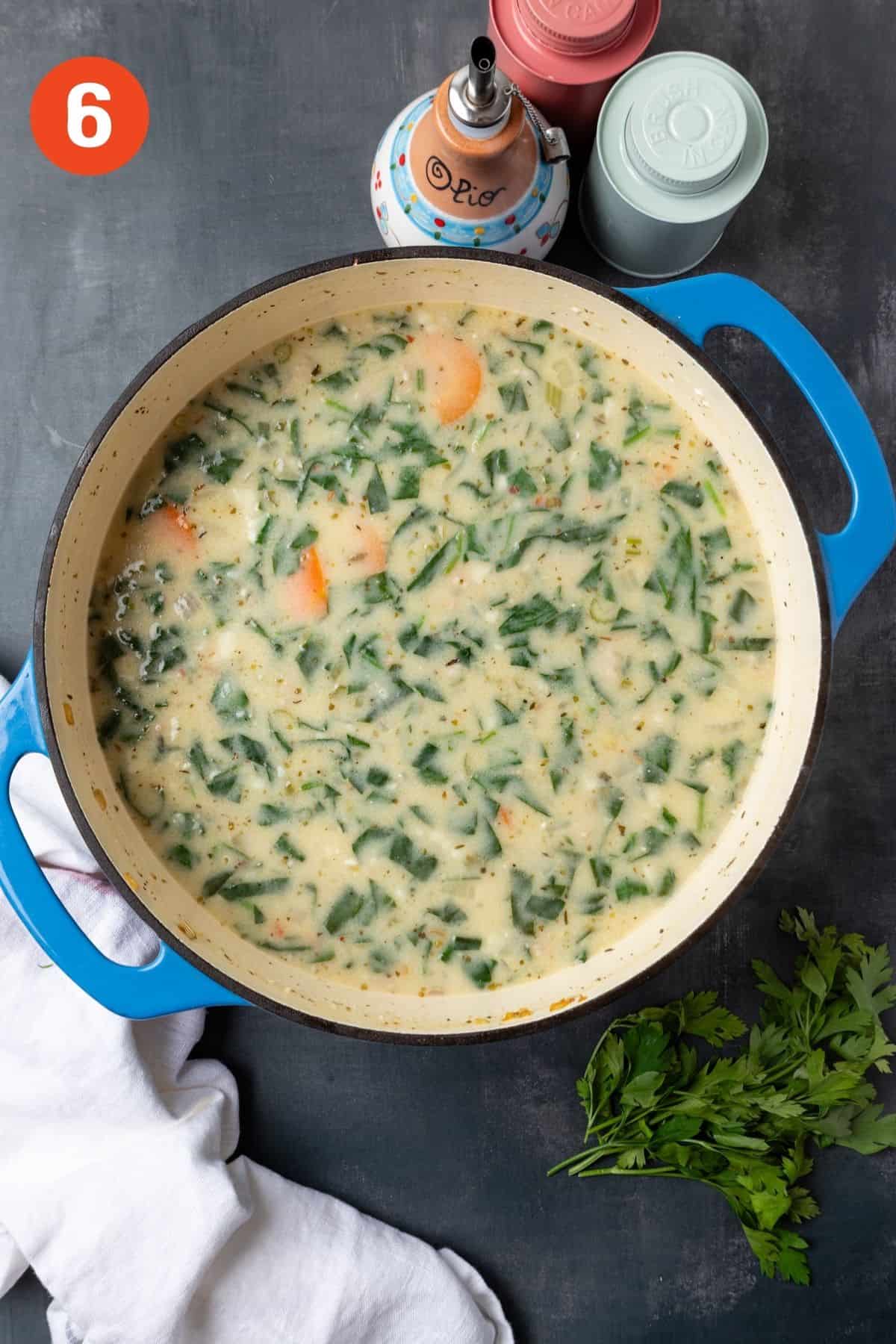 Sausage gnocchi soup in a Dutch oven after cooking.