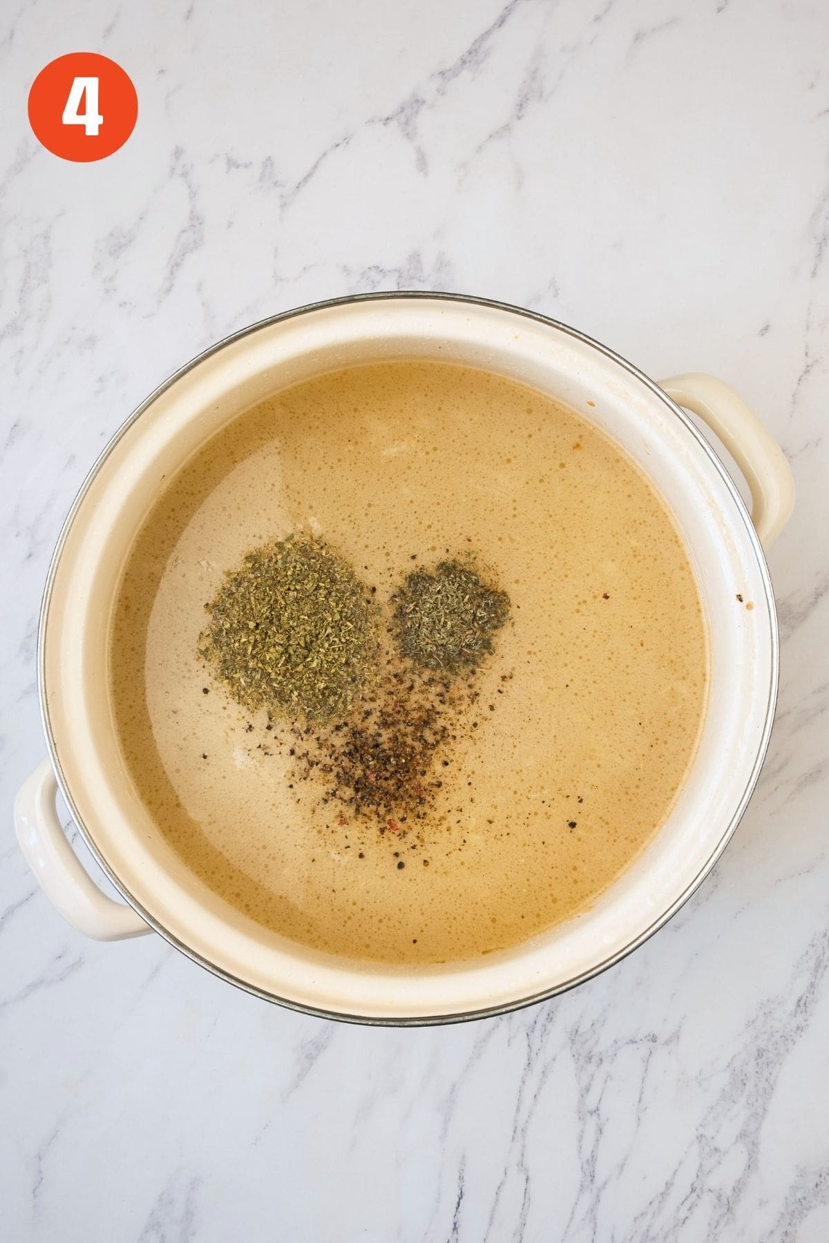 Seasonings added to blended potato broccoli soup.