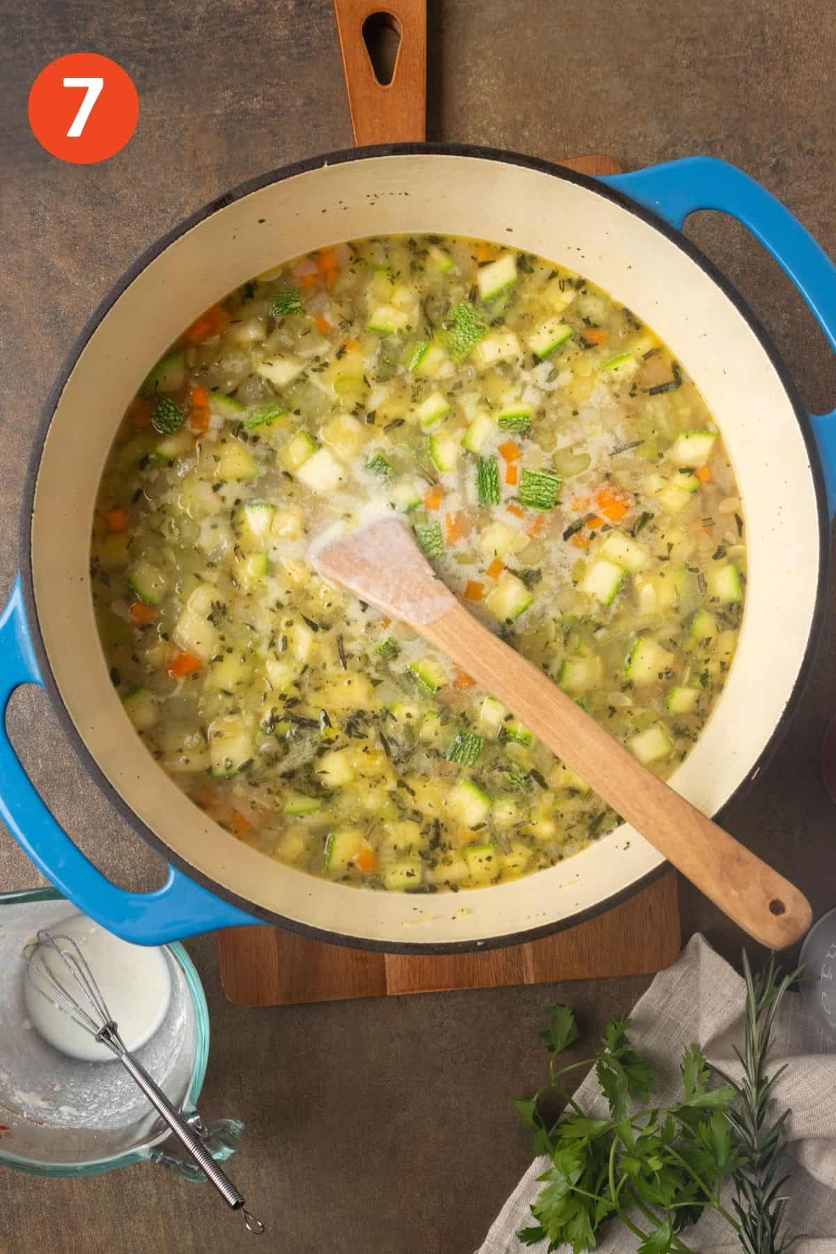 Dairy added to the cooked chicken meatball soup.