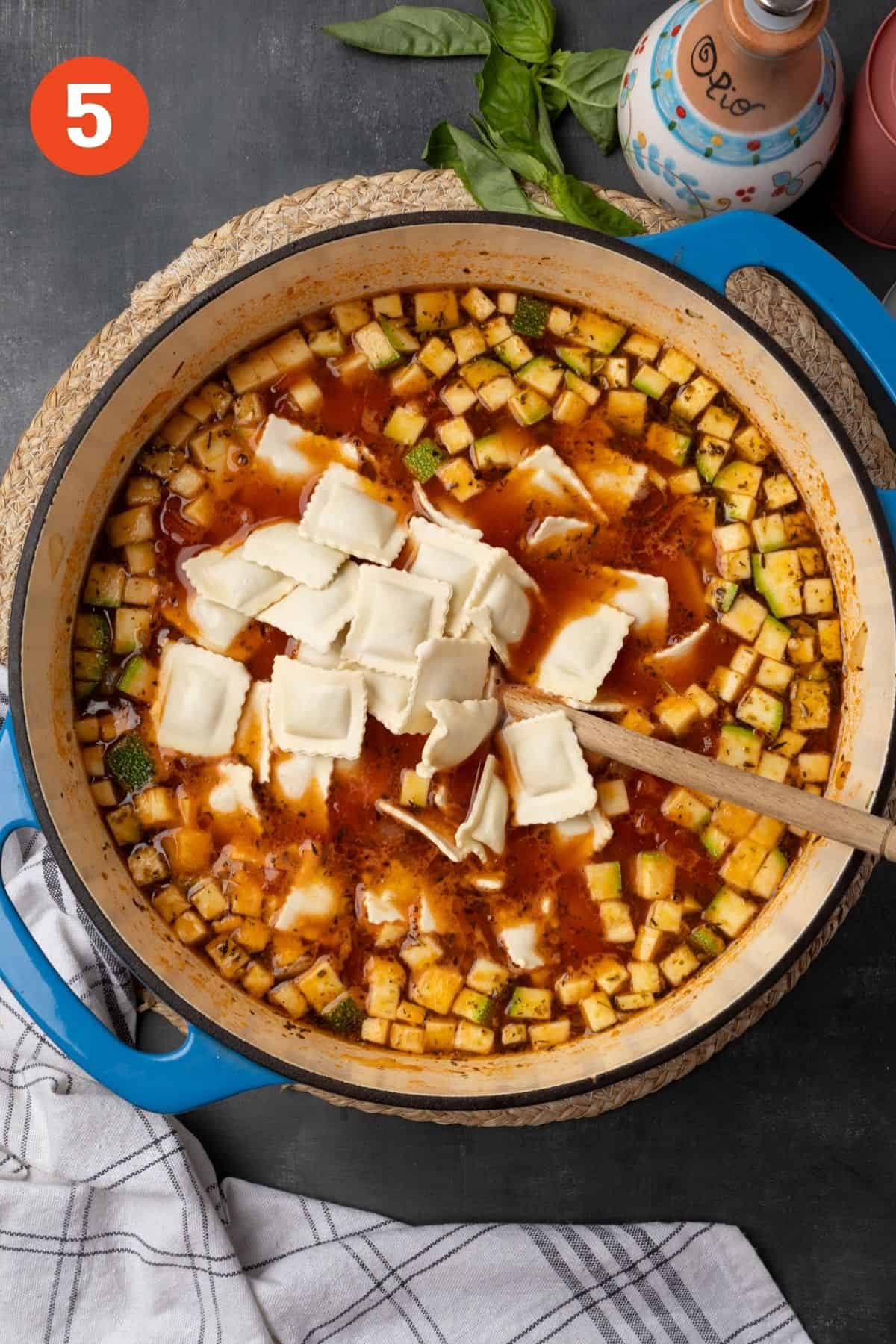 Ravioli added to the pot.