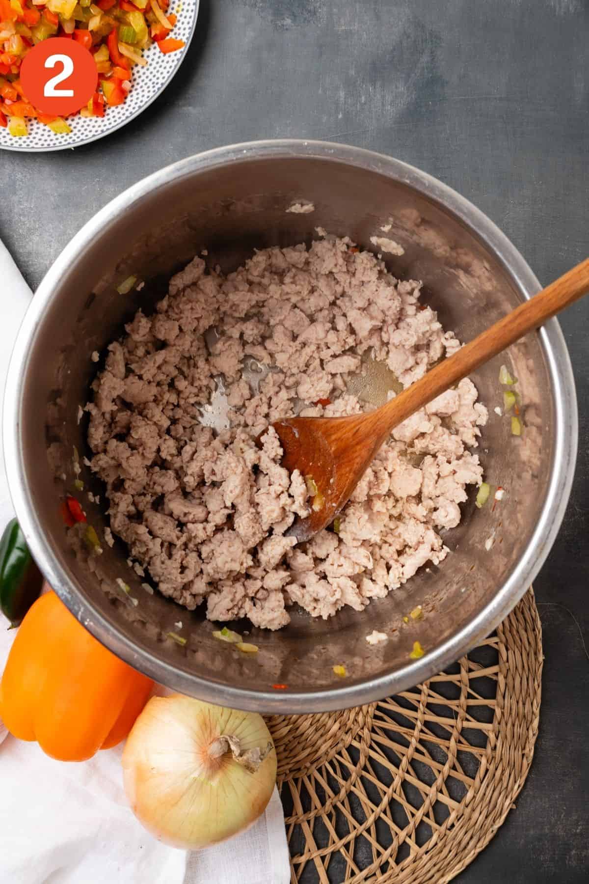 Ground turkey cooking in the Instant Pot.