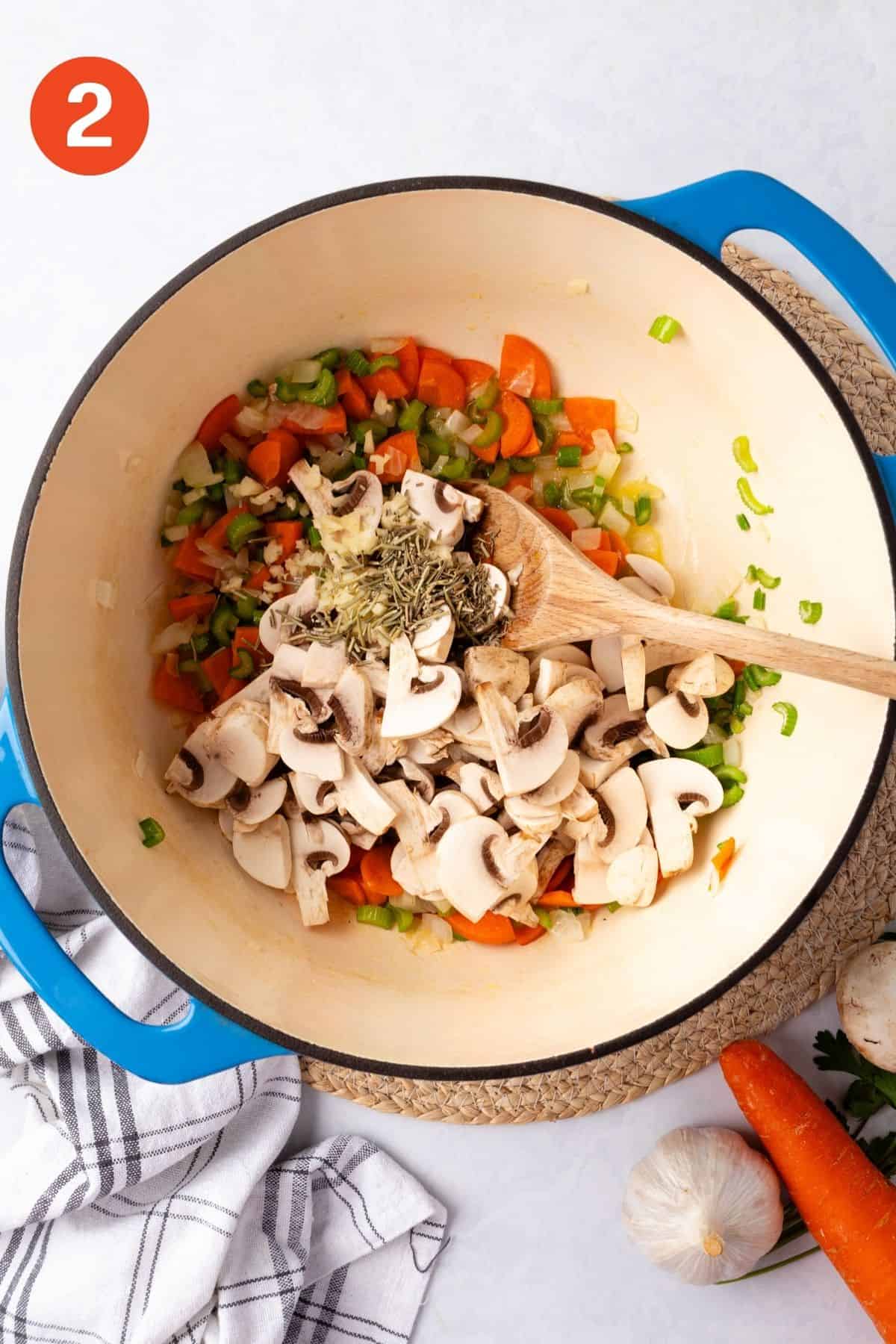 Mushrooms added to the cooked vegetables.