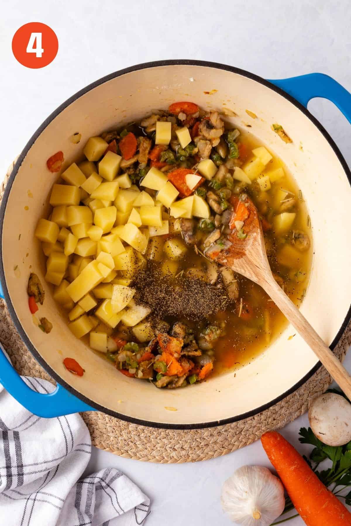 Broth, potatoes, and seasonings added to the pot.
