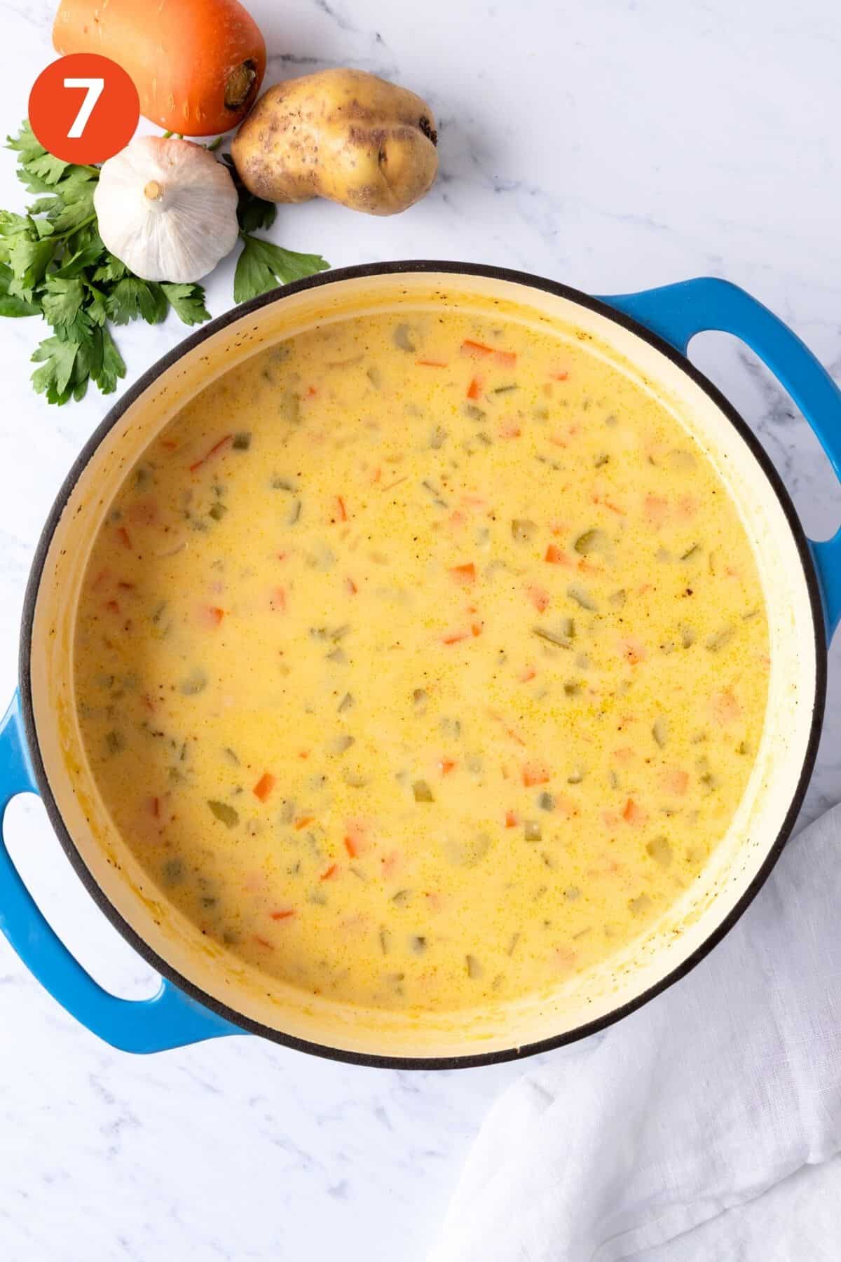 The ham and potato soup cooked in the Dutch oven.