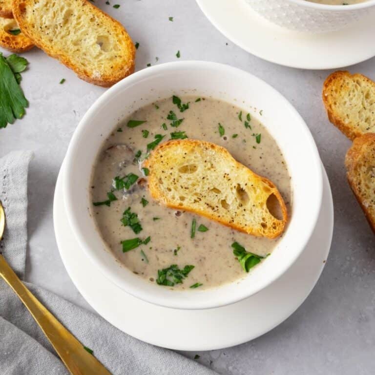 Mushroom brie soup in a bowl.