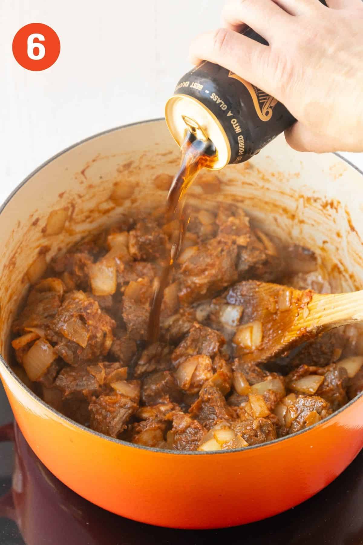 Guinness beer poured into the pot.