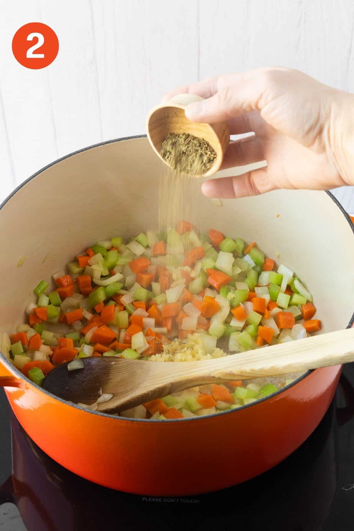 Garlic and seasoning added into the pot.