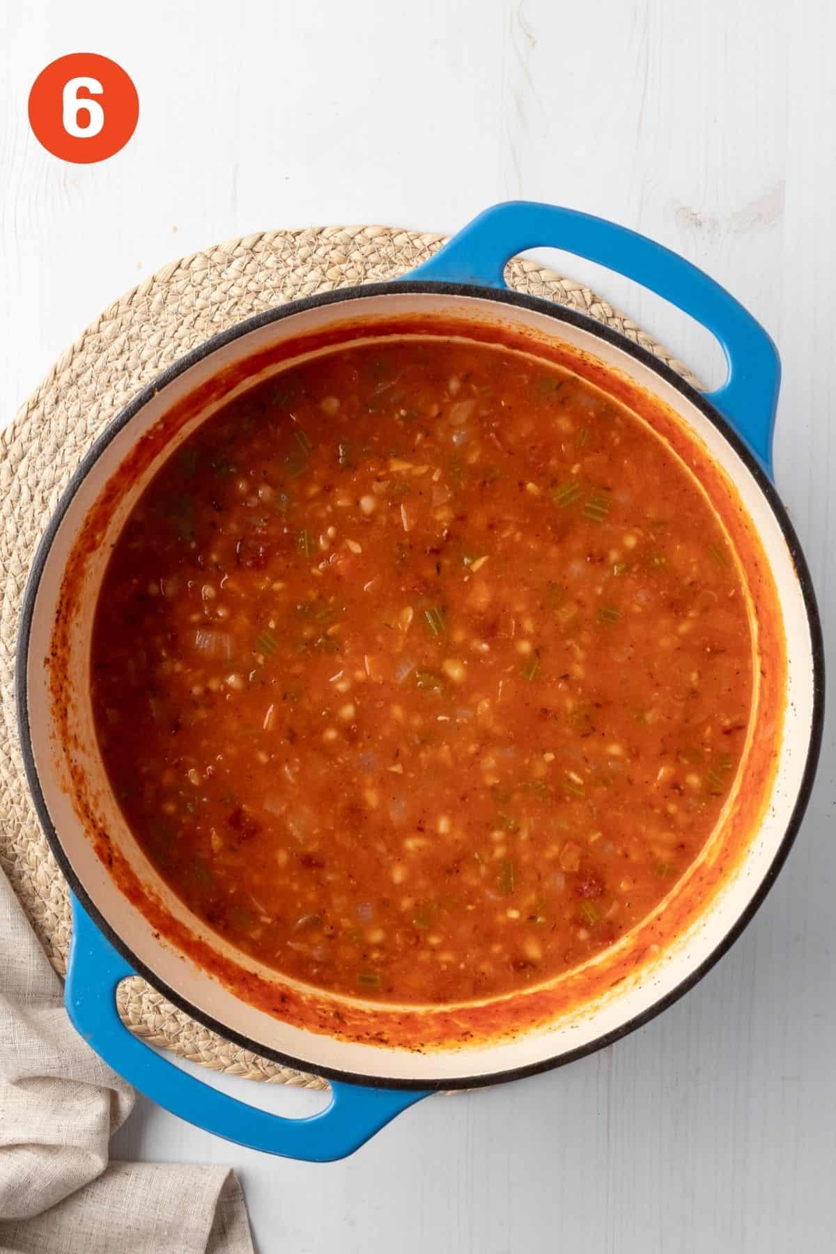 The soup continuing to cook.