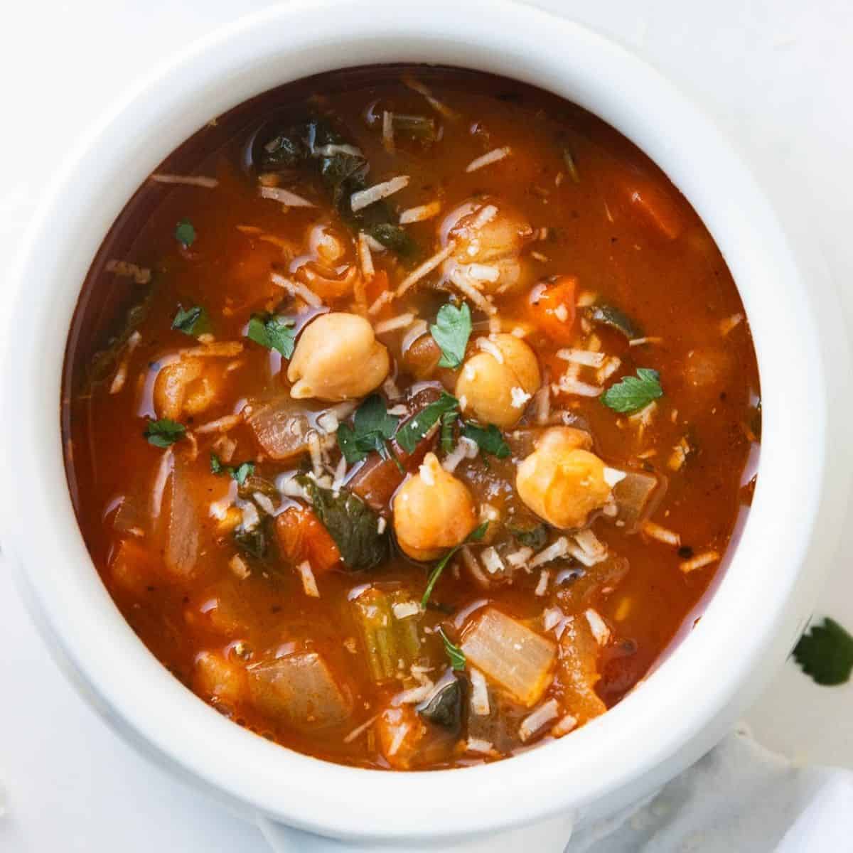 A bowl filled with chickpea soup.