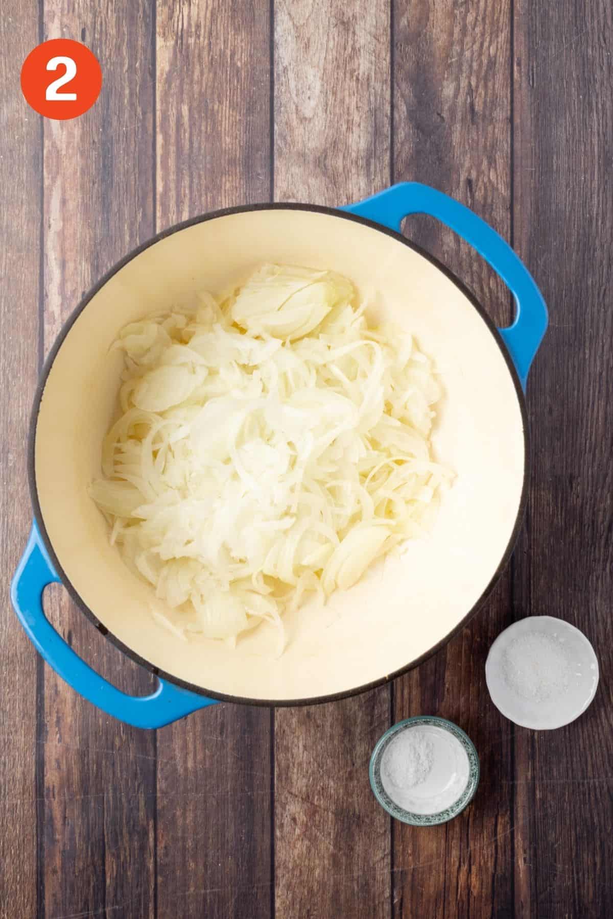 Onions in the pot ready to cook.