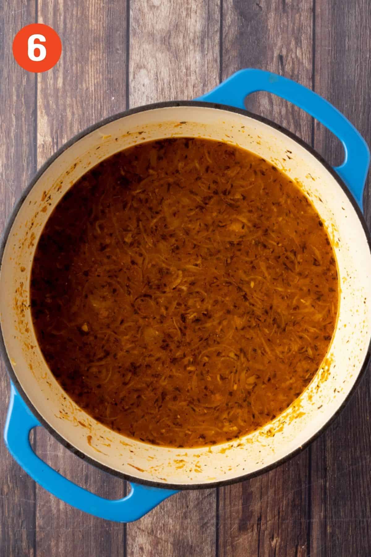 Copycat Panera bread French onion soup ready in a large pot.