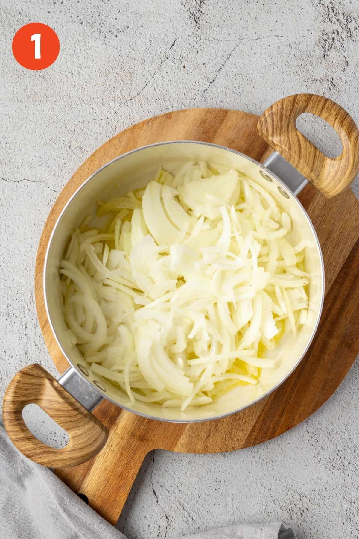 Onions added to a pan.