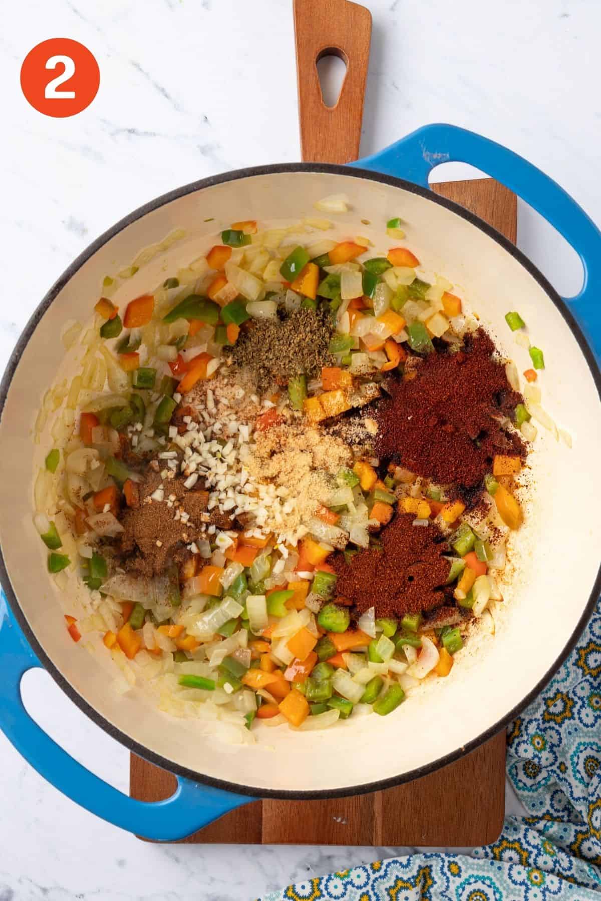 Garlic and spices added to the cooked vegetables.