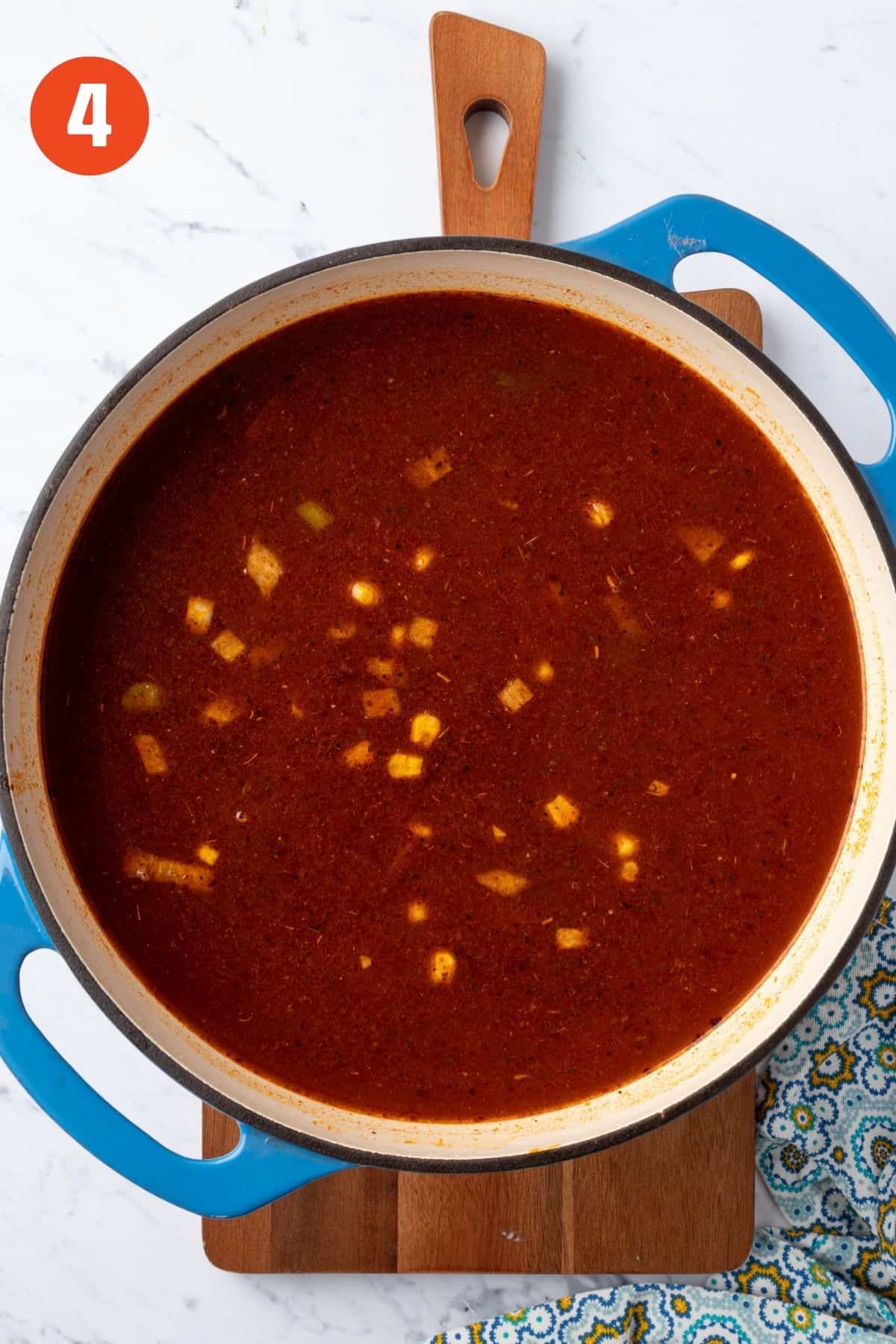 Chicken taco soup in a pot ready to cook.