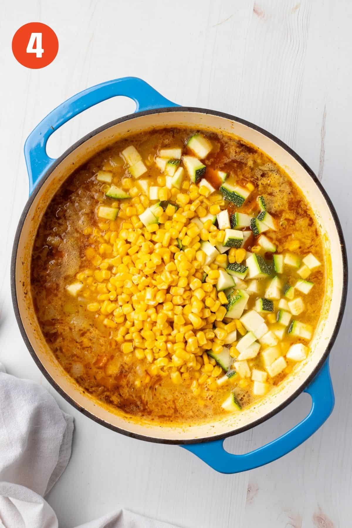Corn and zucchini added to the pot.