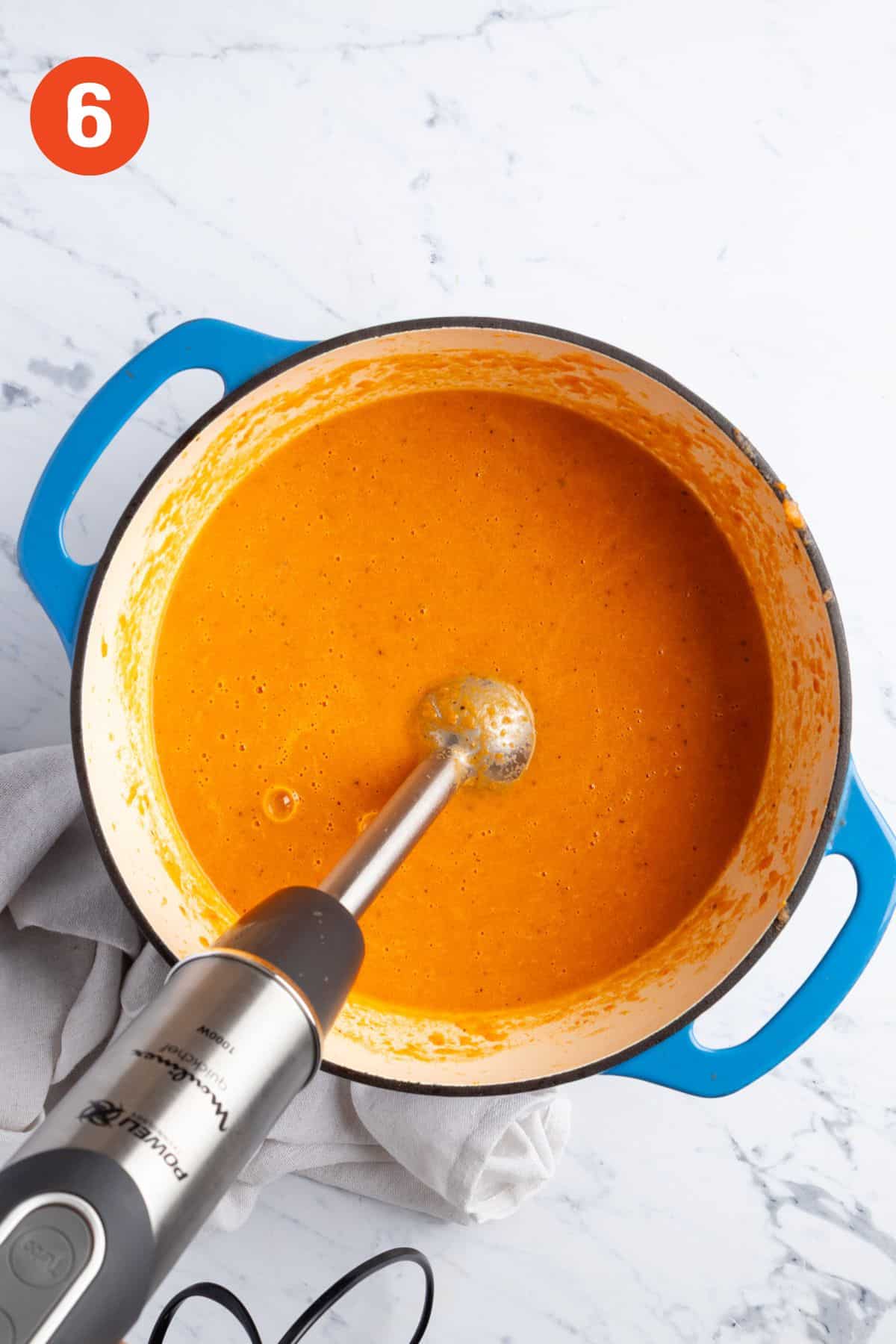 Blending the roasted tomato soup.