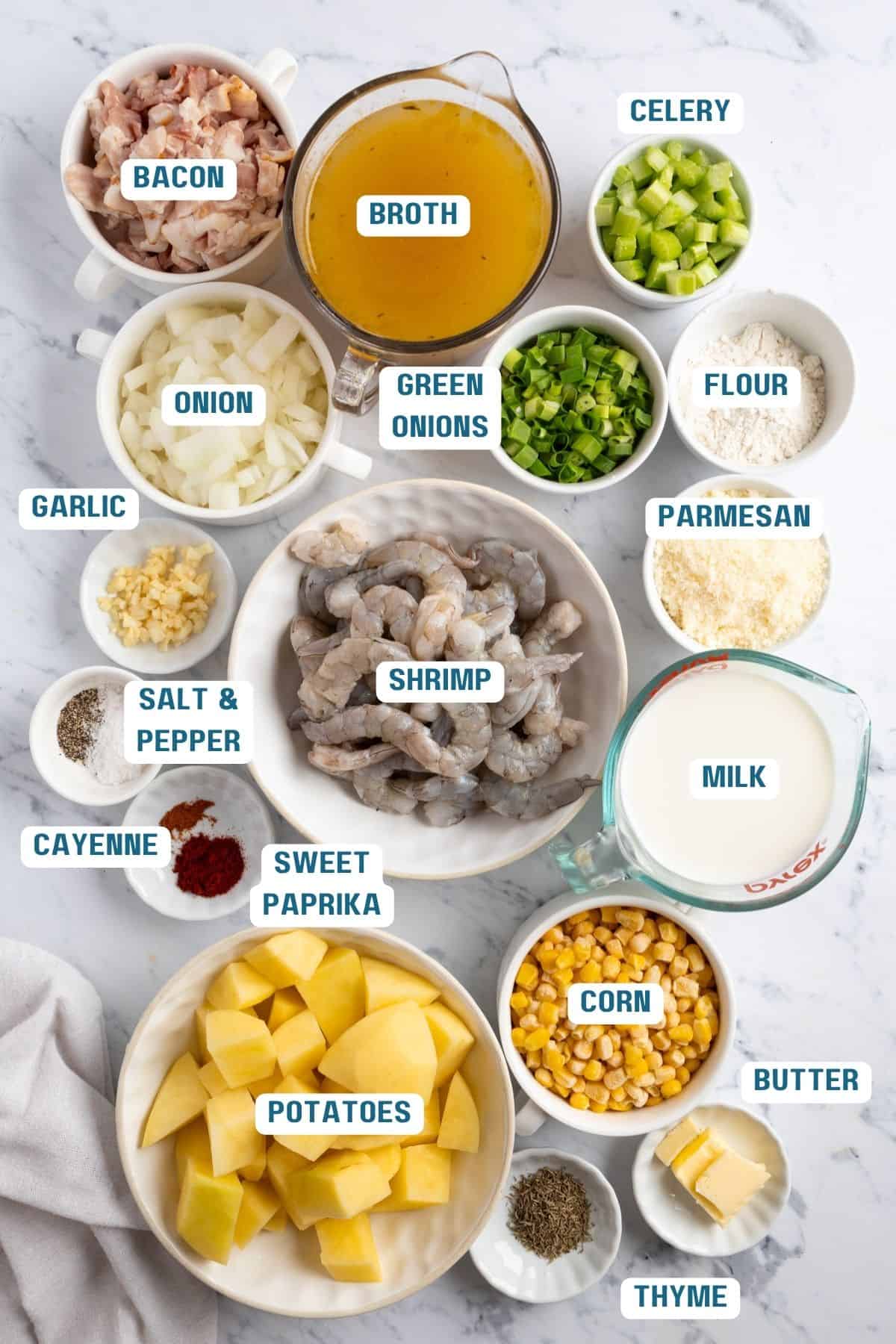 Ingredients to make shrimp corn chowder in bowls on a table.