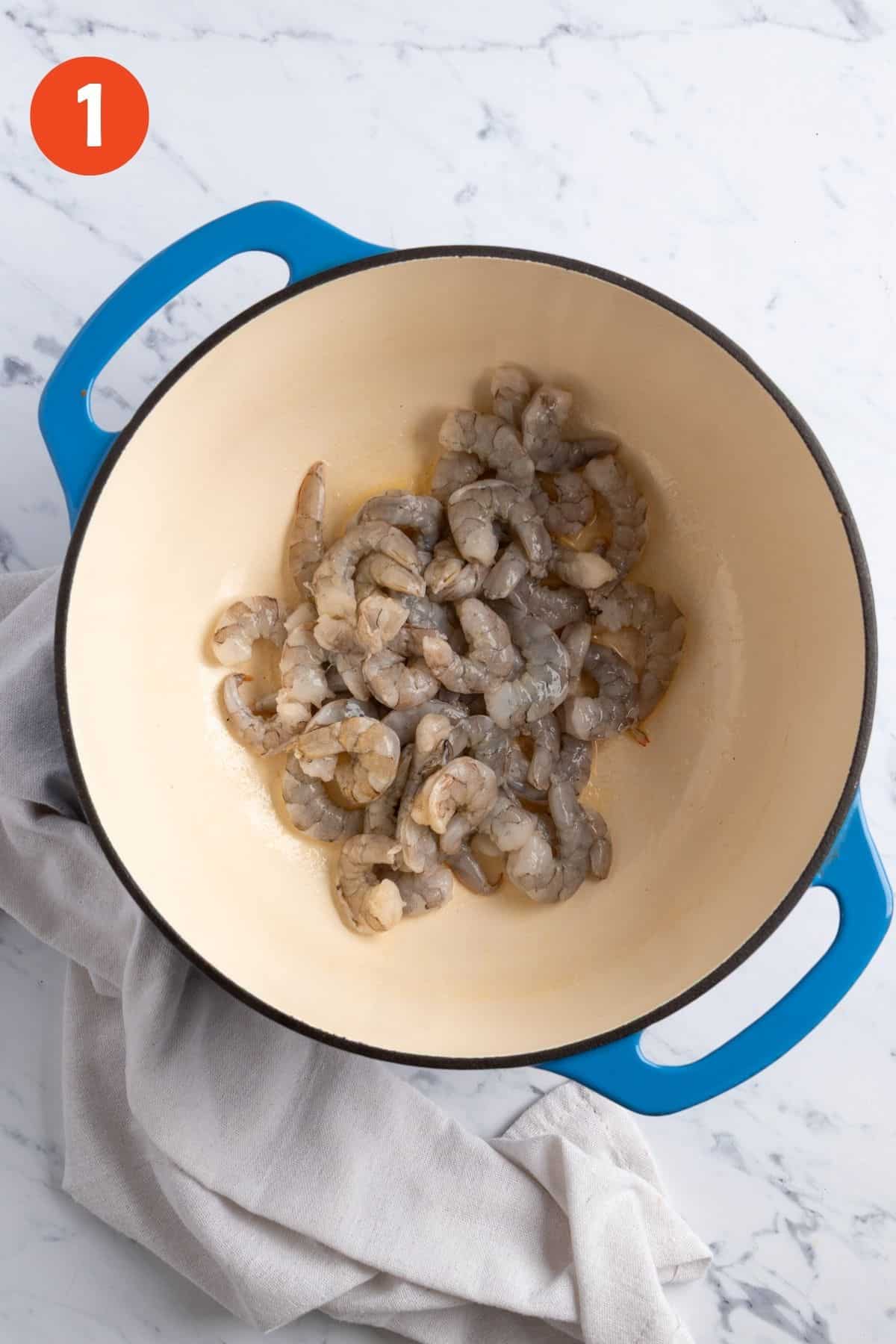 Shrimp added to the pot to cook.