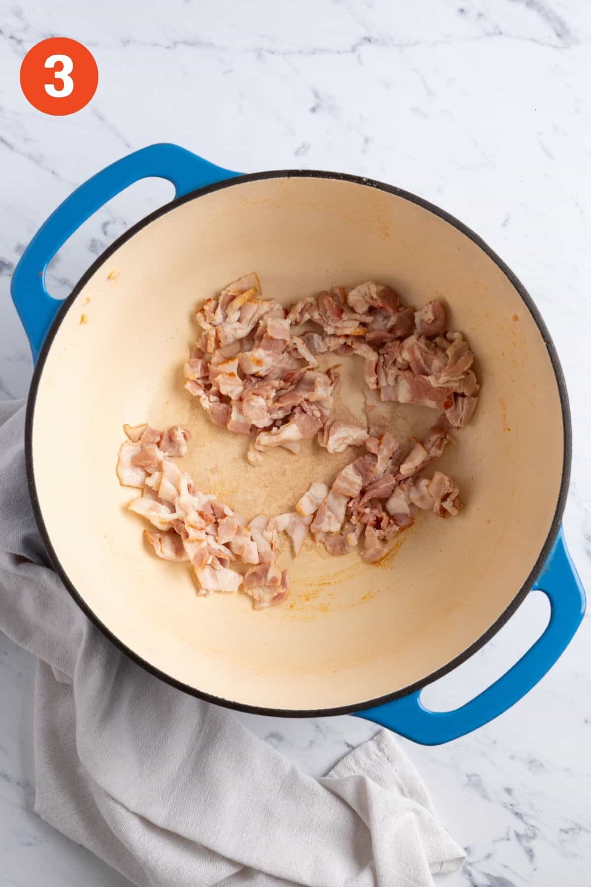 Bacon added to the pot to cook.